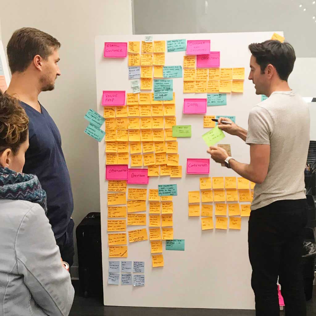 Photo of Nate and Ben collaborating at IDEO on an HR technology project